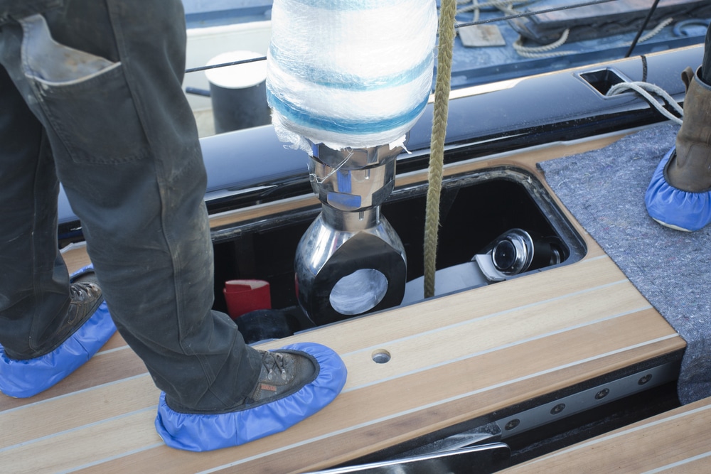 Installing a mast on a yacht in Oakland
