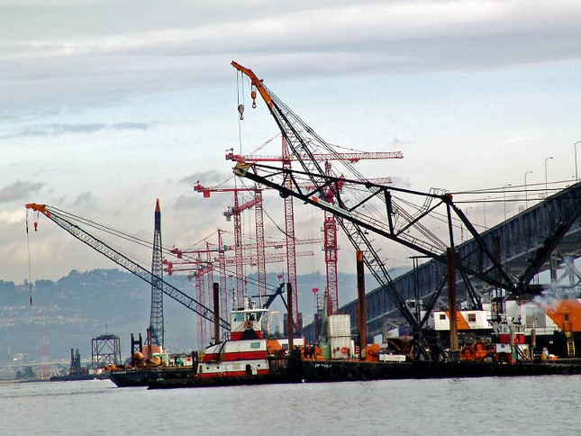 Cranes at Work Near Bay Bridge