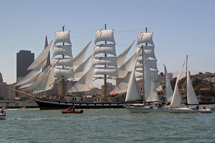 Tall ship Pallada sailing on San Francisco harbor